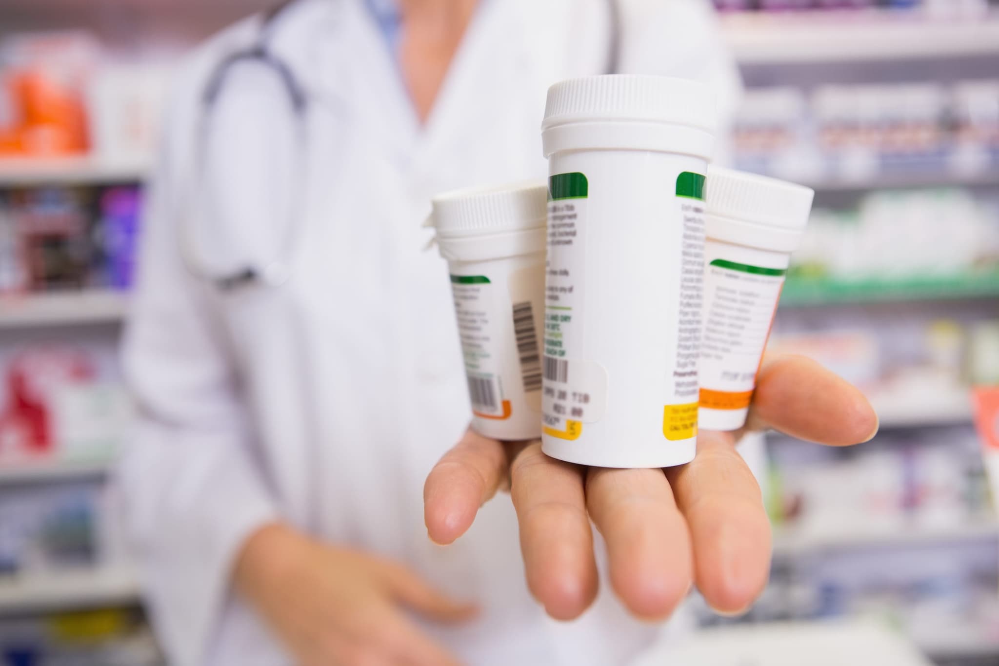 Assorted prescription and over-the-counter medications on a clean surface